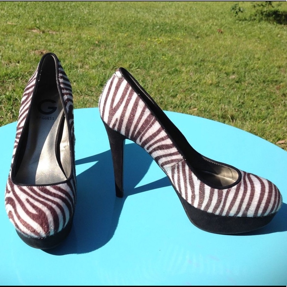 Zebra print platform pumps by Guess